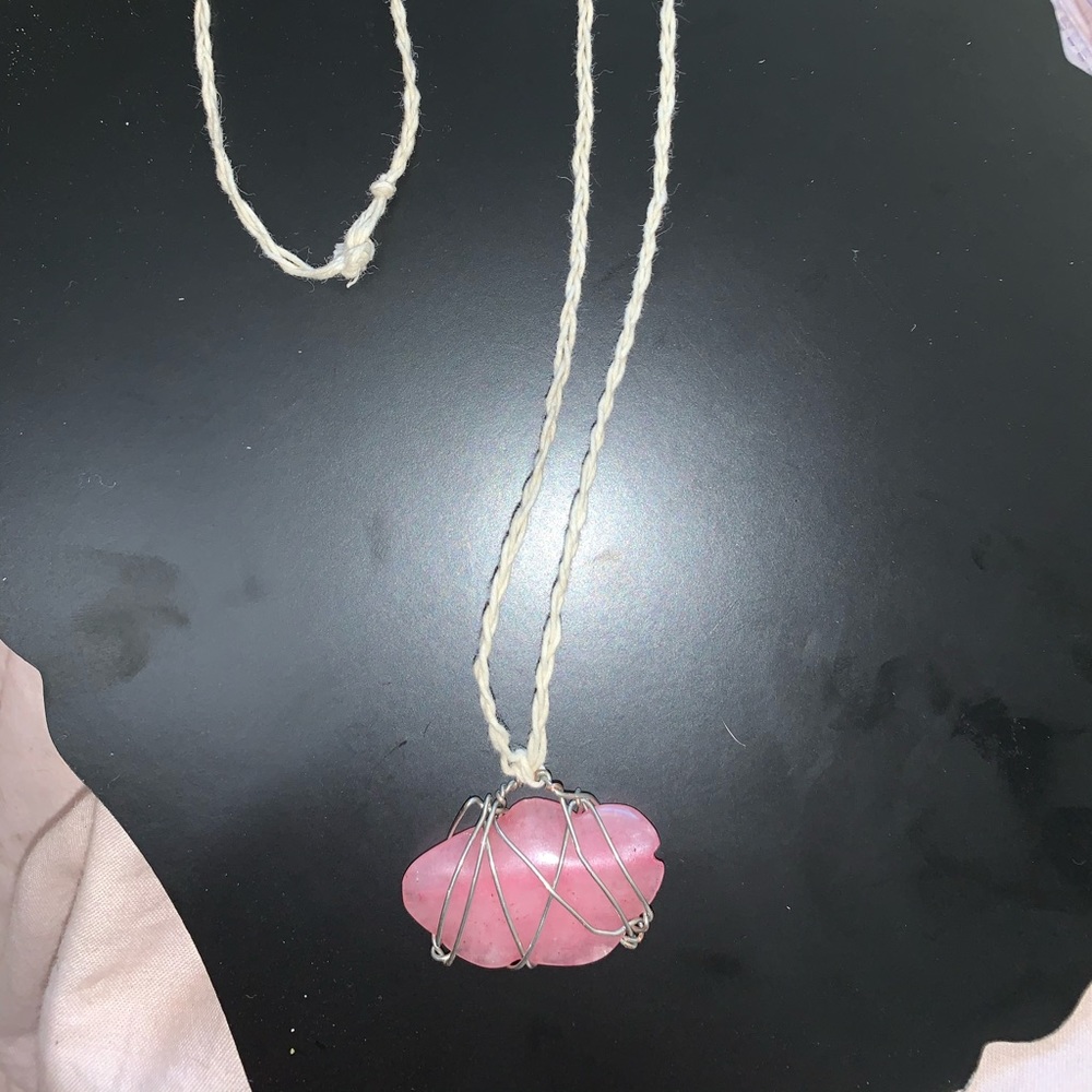 Wire wrapped rose quartz stone